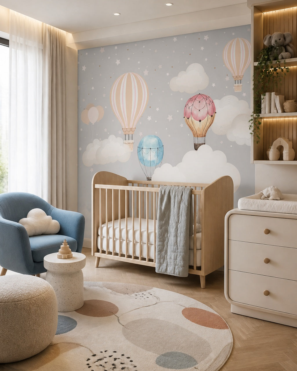 Scandinavian hot air balloons wallpaper in a modern nursery with a crib.