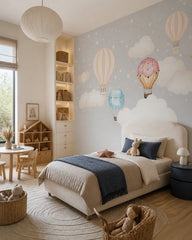 Scandinavian hot air balloons wallpaper in a girl’s bedroom.