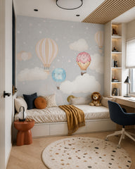 Scandinavian hot air balloons wallpaper in a boy’s bedroom.