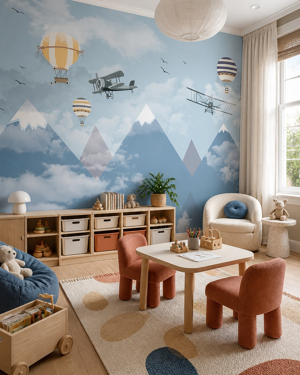 Vintage flights above misty mountains wallpaper in a children’s playroom.