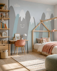 Happy snowy mountains kids room wallpaper in a girl’s bedroom.