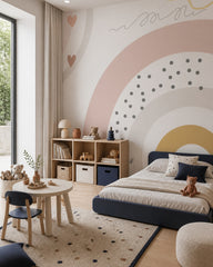 Modern boho rainbow kids room wallpaper in a toddler bedroom with a child-sized bed.