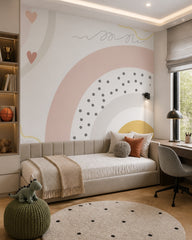 Modern boho rainbow kids room wallpaper in a boy’s bedroom.