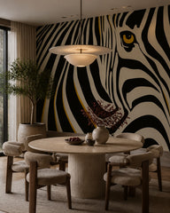 Zebra eye wallpaper in a refined dining area.