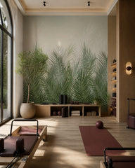 Green palm grass wallpaper in a fitness studio.