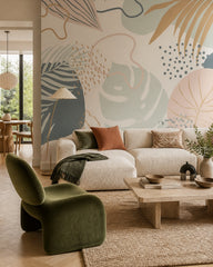 Abstract boho leaves wallpaper in a designer living room.