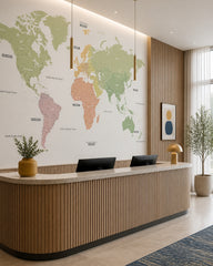 Pastel continents world map wallpaper at a hotel reception desk.
