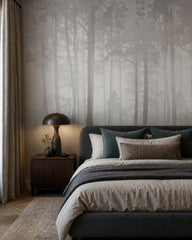 Pale misty forest wallpaper in a designer bedroom.