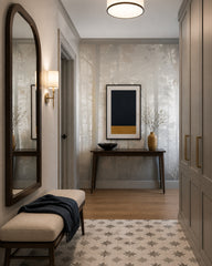 Pale misty forest wallpaper in an architectural hallway.