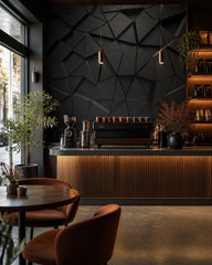 Black 3D geometric wallpaper in a specialty coffee shop.