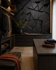 Black 3D geometric wallpaper in a dressing room.