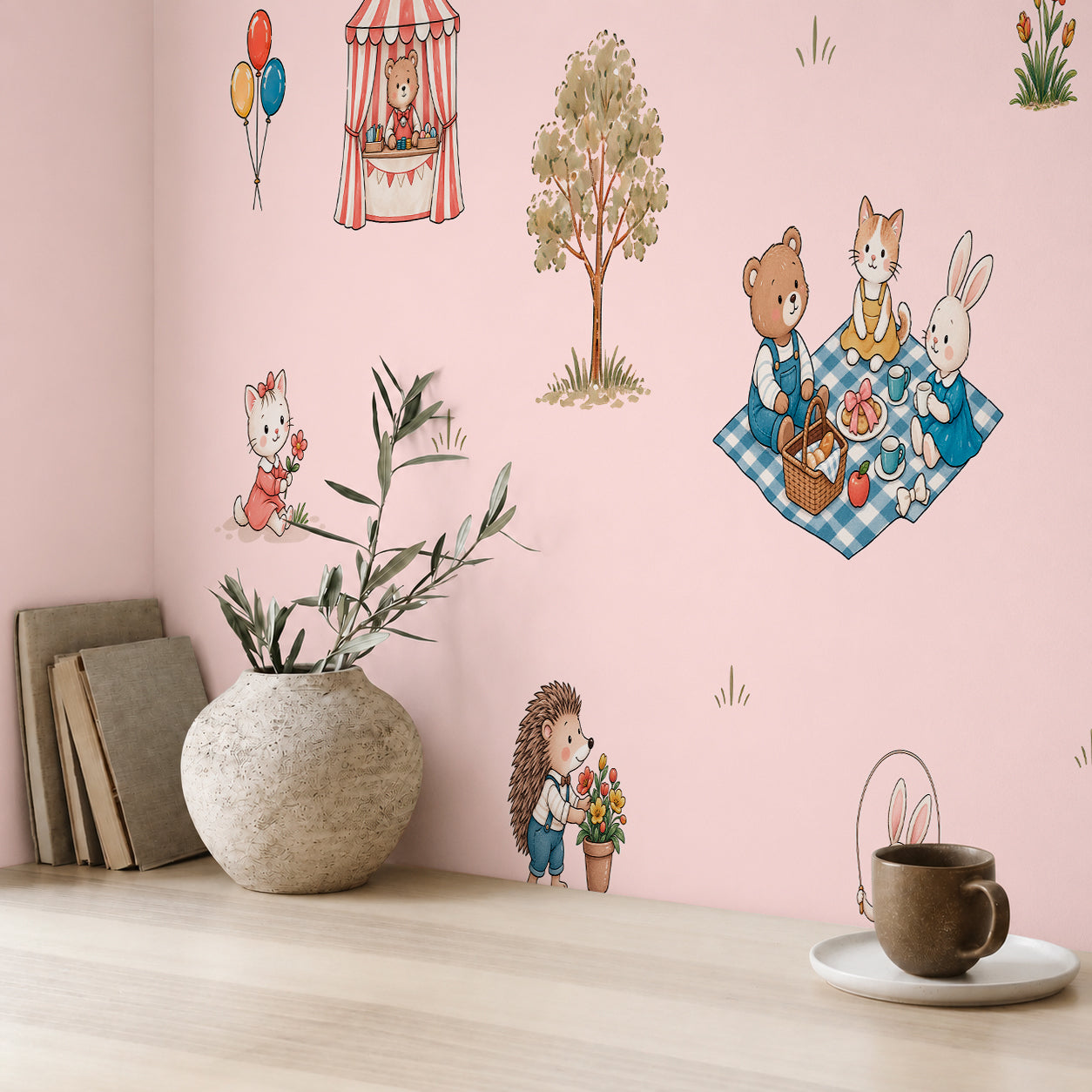 Pink nursery wallpaper with cute animal characters displayed behind a white crib in a soft neutral baby room.