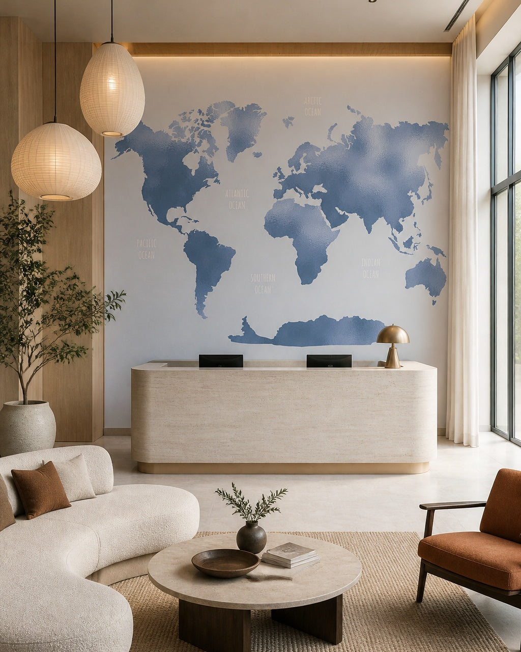 Blue world map wallpaper in a boutique hotel lobby.