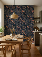 Navy wildflower wallpaper in a dining area.