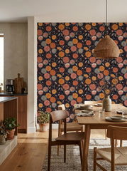 Dark dahlia wallpaper in a dining area.
