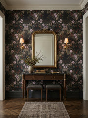 Dark floral wallpaper with lilac blossoms in an entryway.