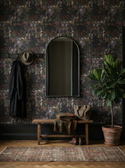 Dark botanical bouquet wallpaper in an entryway.