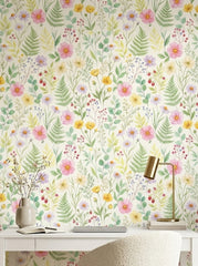 Pastel wildflower wallpaper in a home office.