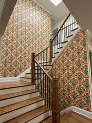 Orange tulip arch wallpaper on a staircase wall.
