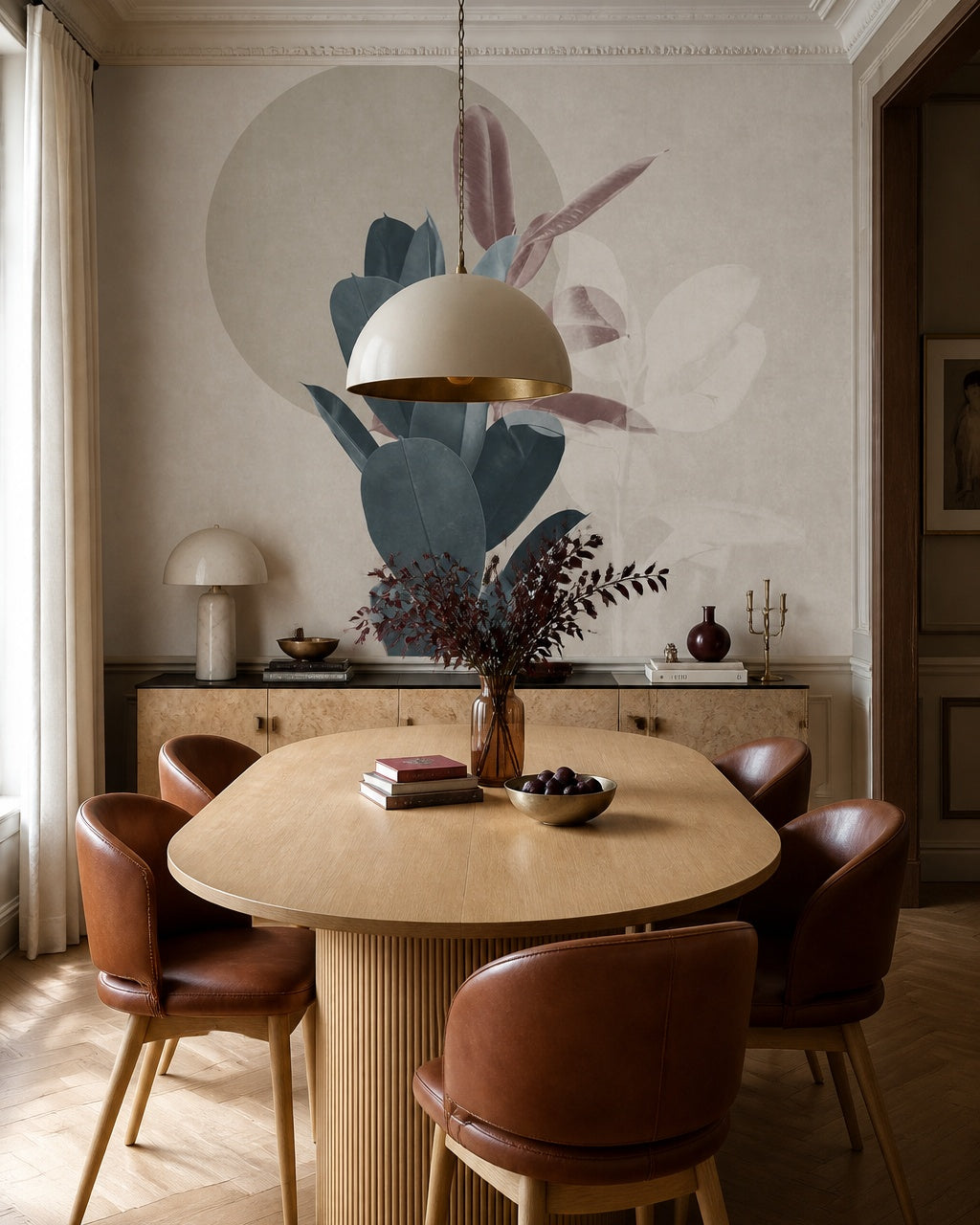 Modern botanical leaves wallpaper in a refined dining area.