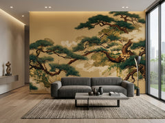 Japanese pine tree wallpaper on gold behind a grey sofa in a minimalist living room.
