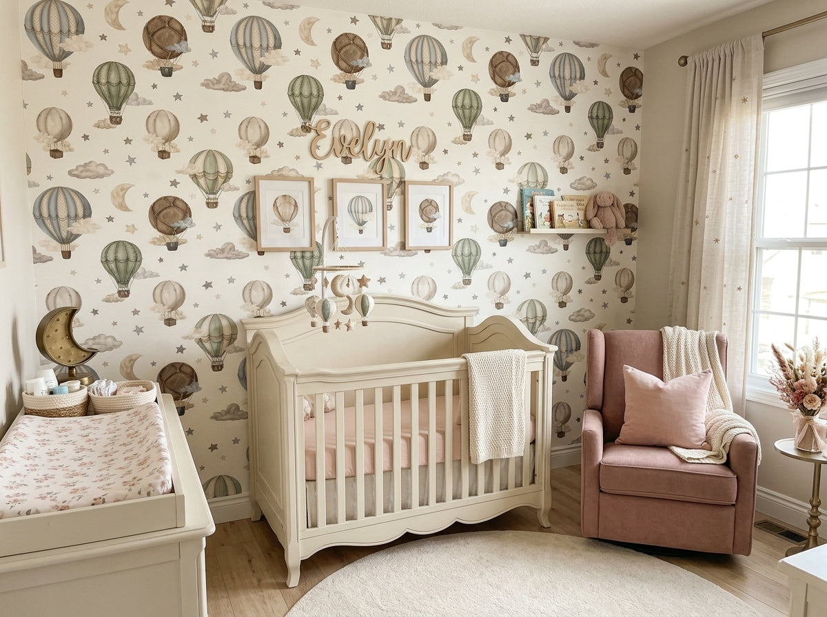 Hot air balloon wallpaper in a neutral nursery with vintage watercolor balloons, clouds, moon and stars.
