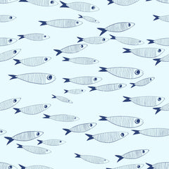 Nautical fish wallpaper used in a modern bathroom with wood vanity, round mirror and glass shower.
