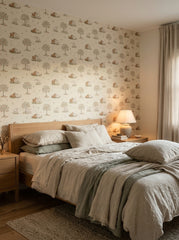 Lambs and apple trees wallpaper in a bedroom.