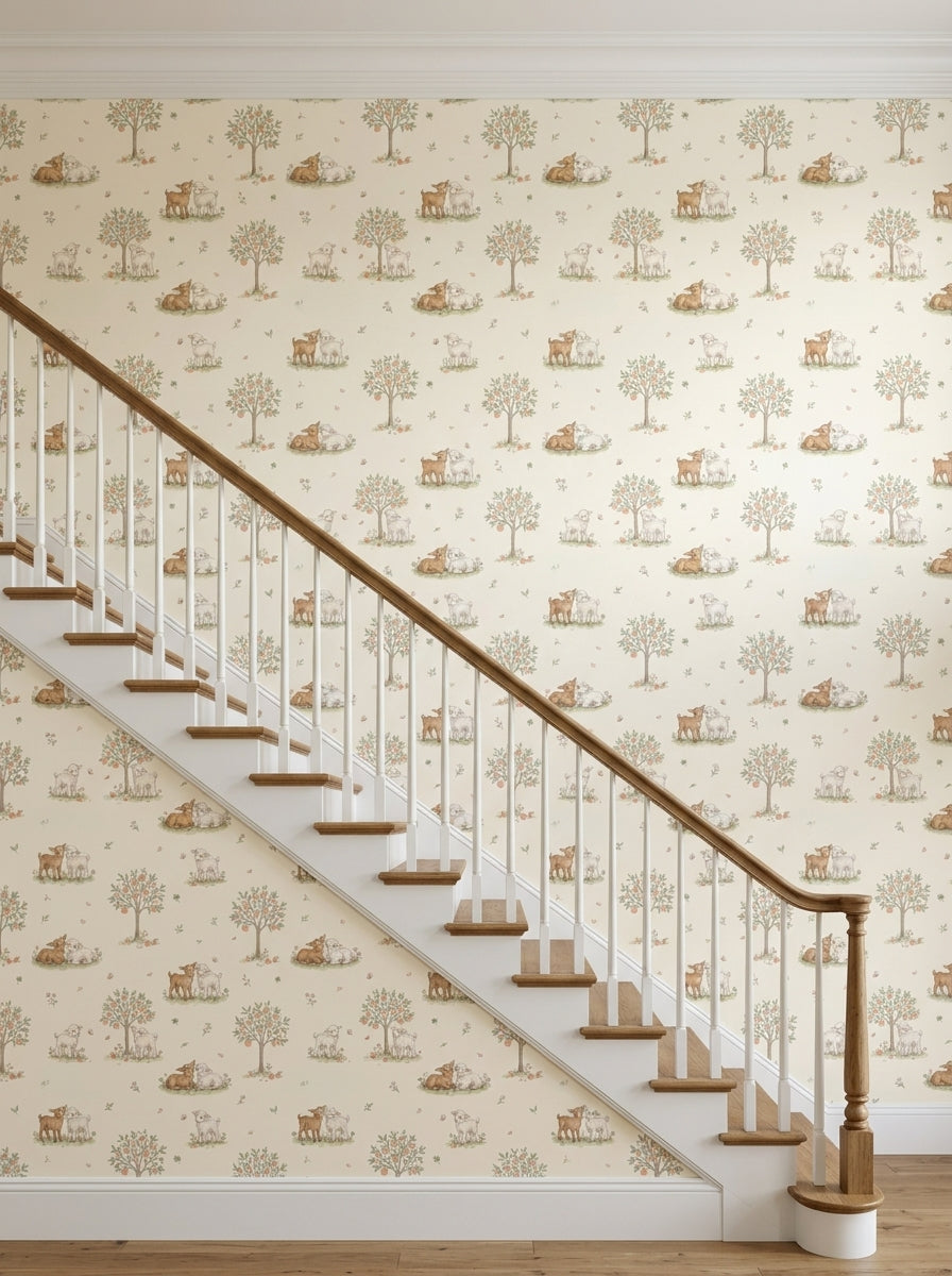 Lambs and apple trees wallpaper on a staircase wall.