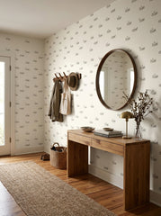 Goats and sheep wallpaper in an entryway.