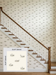 Goats and sheep wallpaper on a staircase wall, shown with a 65 cm (25.6 in) pattern sample.