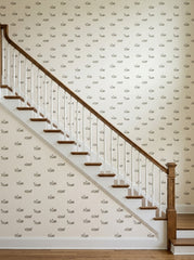 Goats and sheep wallpaper on a staircase wall.
