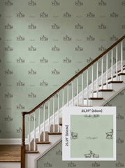 Sage green goats wallpaper on a staircase wall, shown with a 65 cm (25.6 in) pattern sample.