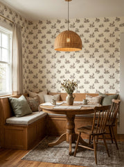 Goat toile wallpaper in a breakfast nook.