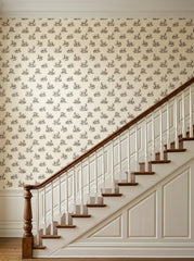 Goat toile wallpaper on a staircase wall.