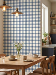 Blue gingham wallpaper in a dining area.