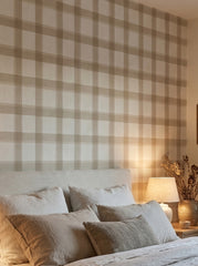 Beige plaid wallpaper in a bedroom.