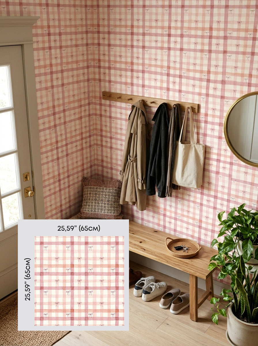 Pink bow plaid wallpaper in an entryway, shown with a 65 cm (25.6 in) pattern sample.