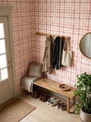 Pink bow plaid wallpaper in an entryway.