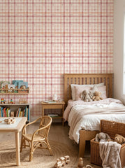Pink bow plaid wallpaper in a kids’ bedroom.