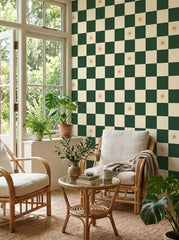 Green checkerboard wallpaper in a sunroom.