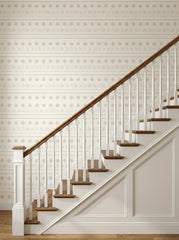 Boho stitch wallpaper on a staircase wall.