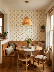 Baby goats wallpaper in a breakfast nook.