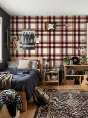 Burgundy plaid wallpaper in a teen room.