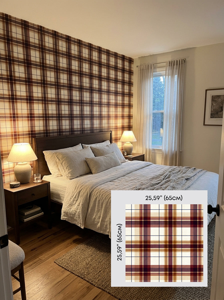 Burgundy and caramel tartan wallpaper in a bedroom, shown with a 65 cm (25.6 in) pattern sample.