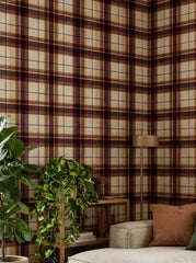 Burgundy and caramel tartan wallpaper in a living room.