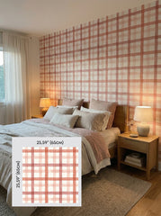 Red watercolour plaid wallpaper in a bedroom, shown with a 65 cm (25.6 in) pattern sample.