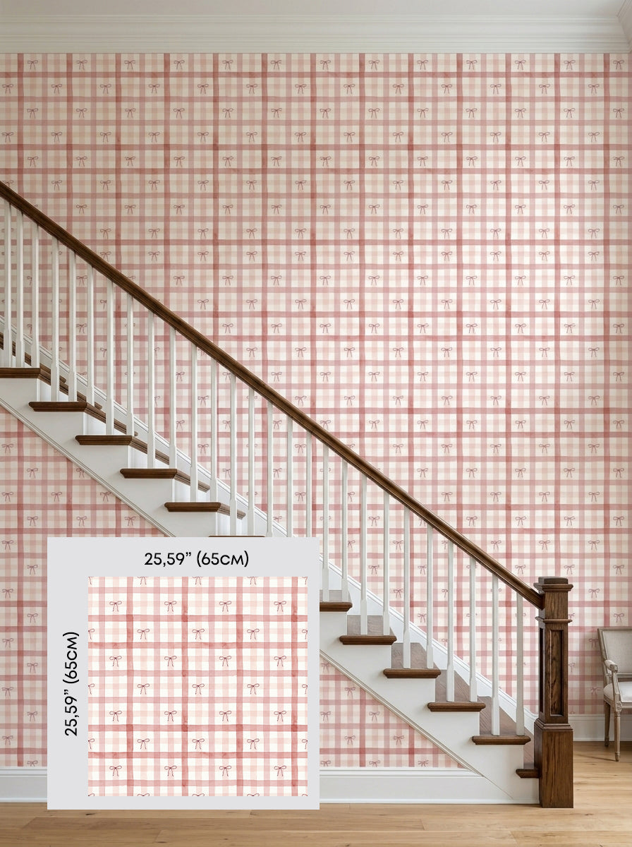 Pink plaid bow wallpaper on a staircase wall, shown with a 65 cm (25.6 in) pattern sample.