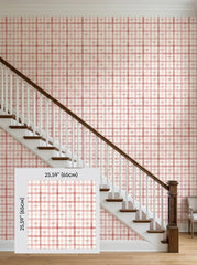 Pink plaid bow wallpaper on a staircase wall, shown with a 65 cm (25.6 in) pattern sample.