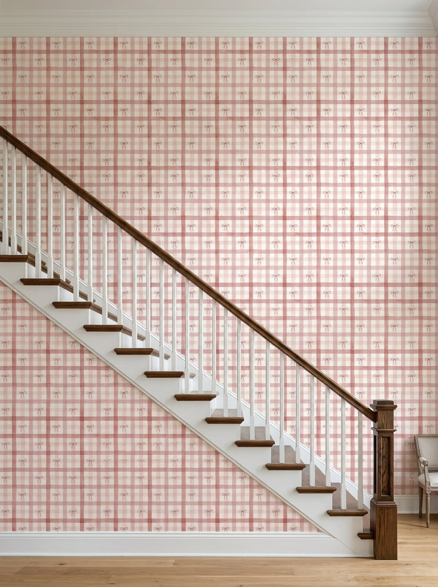 Pink plaid bow wallpaper on a staircase wall.